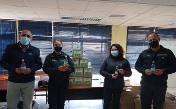 CCU ayuda a combatir la pandemia con importante donación de alcohol gel a personal de gendarmería
