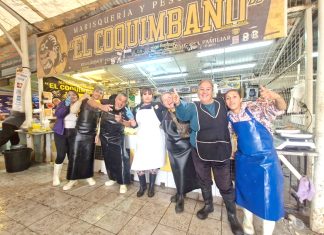 Dedito para arriba en el terminal pesquero para que el barbón baje la ansiada estrella
